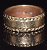 A 9ct gold ring/ wedding band, size O/P, 5.2g