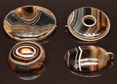 Three Victorian banded agate brooches and a banded agate pendant