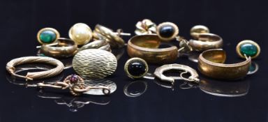 Three pairs of 9ct gold earrings, further single 9ct gold earrings, and a yellow metal brooch set