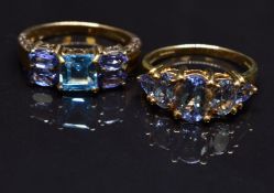 A 9ct gold ring set with topaz and paste and another 9ct gold ring set with paste, size N, 6g