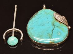 Navajo silver pendant set with turquoise and another pedant set with amazonite