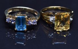 Two 9ct gold rings, one set with a blue topaz the other a citrine, size N & M, 7.1g