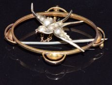 Edwardian 9ct gold brooch set with seed pearls in the form of a swallow, 2.1g