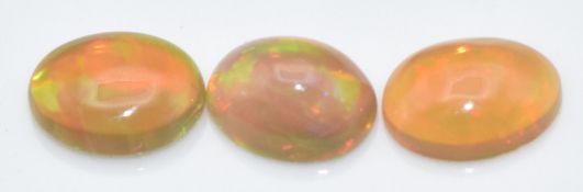 A loose oval opal cabochon measuring approximately 2.23cts