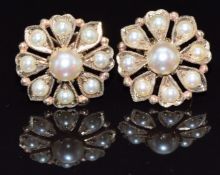 A pair of 9ct gold earrings set with split pearls, 4.9g