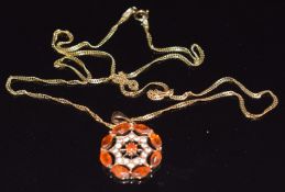 A 9ct gold pendant set with marquise cut fire opals and white sapphires on a 9ct gold chain, 3.8g