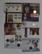 A collection of largely £5 Royal Commemorative coin and stamp presentation packs