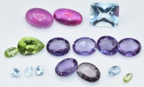 Five synthetic colour change sapphires, four pale blue sapphires, aquamarine, peridot and two pink