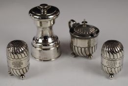 Victorian hallmarked silver cruet set comprising two peppers and a mustard with blue glass liner,
