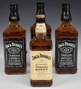 Three Jack Daniel's Old no7 Tennessee Whiskey, 1ltr, 40% vol and a Jack Daniel's Tennessee Honey