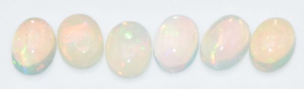 Six loose oval opal cabochons, total approximately 3.10cts