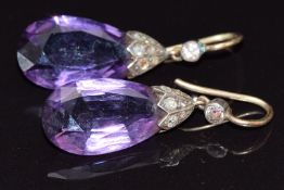 A pair of c1910 earrings set with pear cut amethyst and rose cut diamonds, 4.6g, 2.6cm long