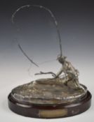 Hallmarked silver model of a fisherman mid stream, London 1981, maker Ammonite Ltd, on wooden
