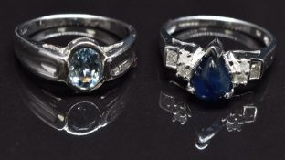 Two 9ct white gold rings, one set with a sapphire and diamonds the other with an aquamarine, size N,