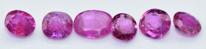 Six loose oval and round cut natural unheated Burmese rubies, total carat weight approximately 3.