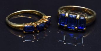 Two 9ct gold rings set with synthetic sapphires, size N, 7.2g