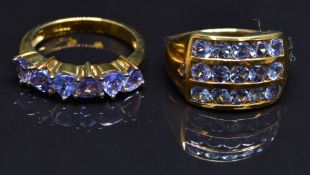 Two 9ct gold rings set with tanzanites, size N, 7.3g