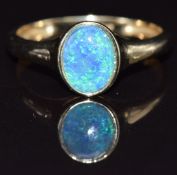 A 9ct gold ring set with an opal triplet, size N, 1.7g