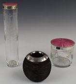 Two Art Deco hallmarked silver and pink guilloché enamel dressing table bottles or pots, both with