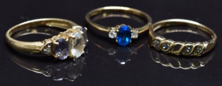 Three 9ct gold rings set with diamonds and quartz, size N, 5.8g