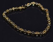 A 9k gold bracelet set with quartz, 10.2g