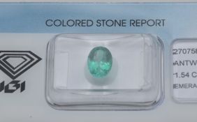 A loose 1.54ct oval mixed cut Columbian emerald with certificate