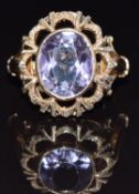 A 9ct gold ring set with an oval cut amethyst, size O, 4.9g