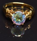 A 9k gold ring set with mystic topaz, size N, 3g