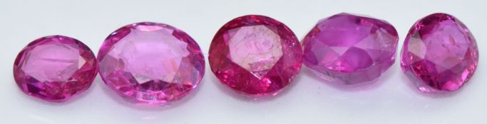 Five loose round and oval cut natural unheated Burmese rubies, total carat weight approximately 2.