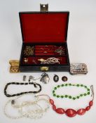 A collection of costume jewellery including Wedgwood pendant, silver locket, ingot, earrings etc