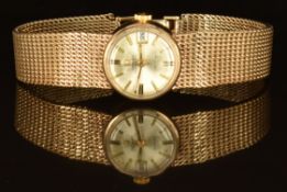 Omega 9ct gold ladies automatic wristwatch with date aperture, gold hands, baton hour markers,