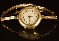 Unnamed 18ct gold ladies wristwatch with blued hands, black Arabic numerals, silver dial and