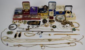 A collection of costume jewellery including Napier earrings, brooches, silver etc