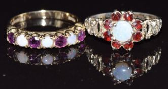 A 9ct gold half eternity ring set with opals and garnets and a silver ring set with an opal and