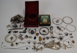 A collection of silver jewellery including cufflinks, bangles, brooches, rings, necklaces, Russian