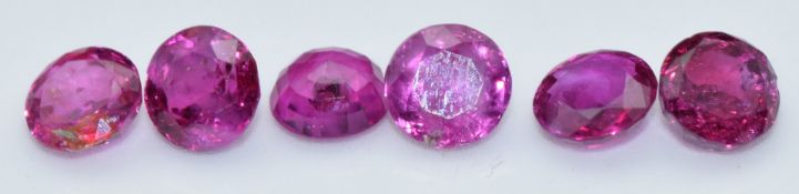 Six loose round cut natural unheated Burmese rubies, total carat weight approximately 3.25cts
