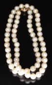 A single strand of cultured pearls with 9ct gold clasp