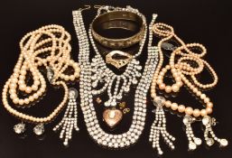 A silver bangle with gold plate, a section of 9ct gold (2.6g), 9ct gold back and front locket set