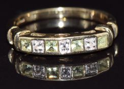 A 9ct gold half eternity ring set with peridot and diamonds, size N, 2.7g