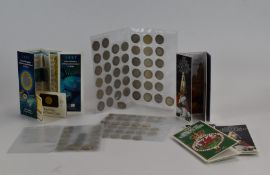 A collection of UK collectable £2 coins and 'round pounds', some in presentation packs