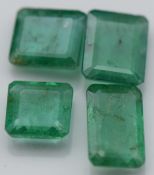 Four loose emerald cut emeralds, total approximately 2.73cts