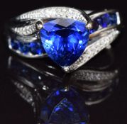 A 10k white gold ring set with synthetic sapphires and diamonds, size M, 3.6g