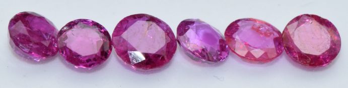 Six loose round and oval cut natural unheated Burmese rubies, total carat weight approximately 3.
