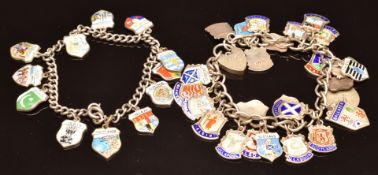 Two silver charm bracelets with enamel shield charms, 64g