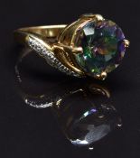 A 9k gold ring set with quartz and zircon, size M, 7.2g