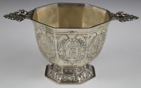 Dutch silver twin handled octagonal bowl with engraved decoration of figures and Dutch silver