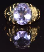 A 9ct gold ring set with an oval cut amethyst, size M, 5.1g