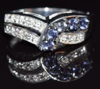 A 9k white gold ring set with iolite and white topaz, size J, 1.9g