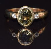 A 9k gold ring set with tourmaline and topaz, size N, 3g