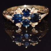 A 9ct gold ring set with four oval sapphires, size N, 4.5g